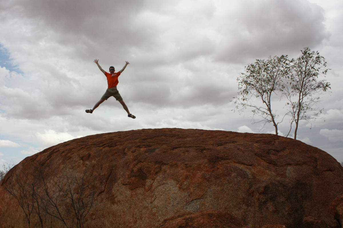 Hayko Riemenschneider jumping at a rock (515m) near Uluru / Ayers Rock, Australia!